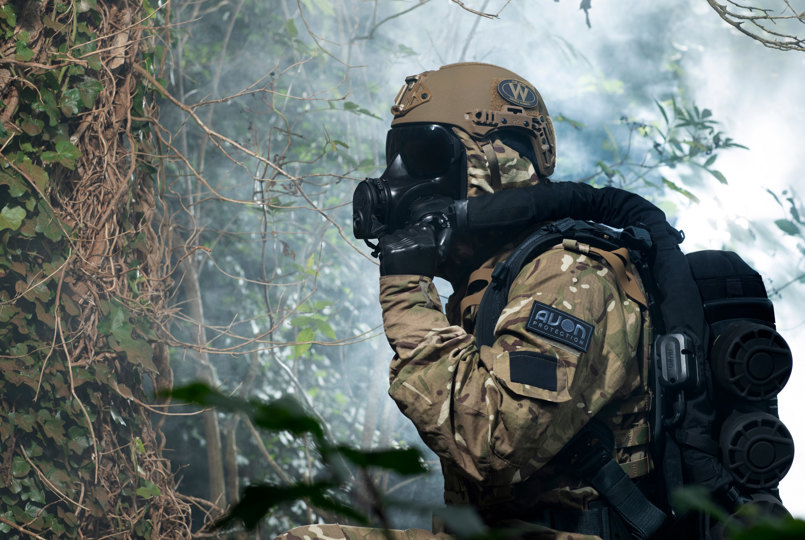 Soldier wearing a helmet and respirator