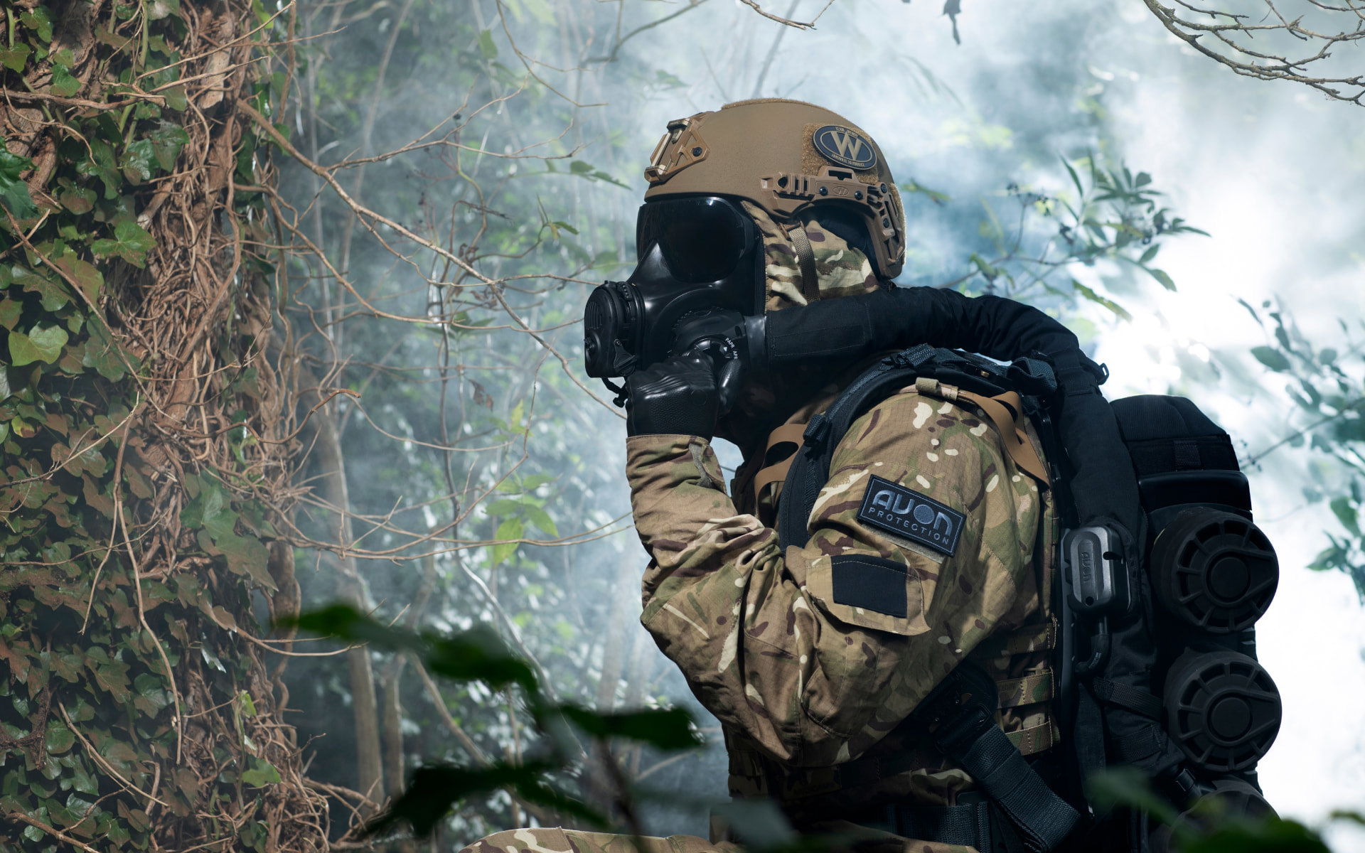 Soldier wearing a helmet and respirator