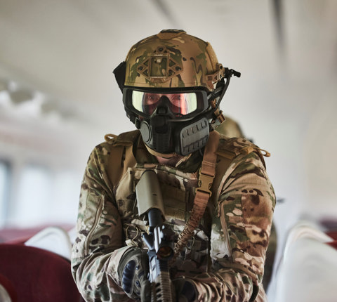 Soldier wearing a helmet and respirator