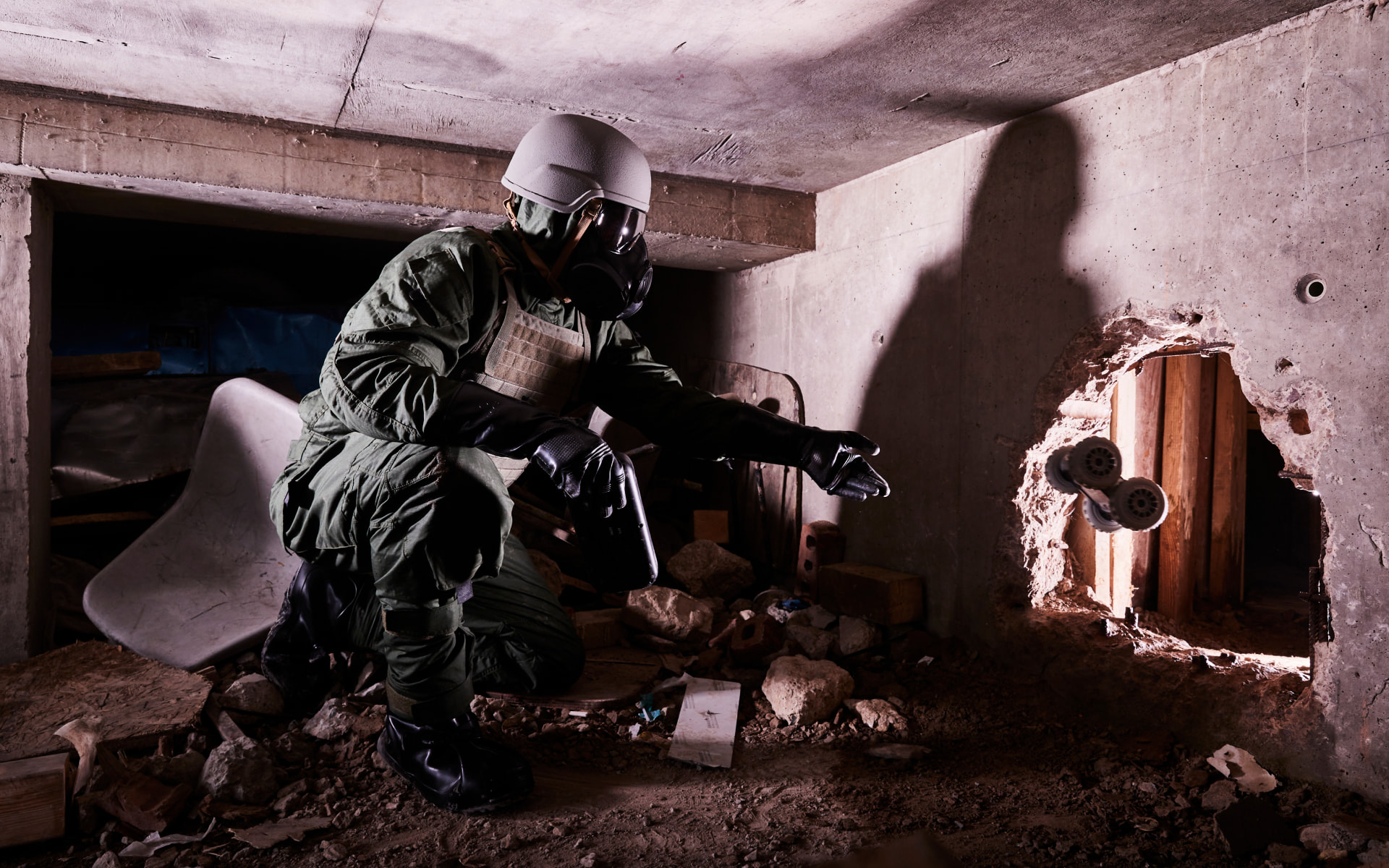 Soldier wearing a helmet and respirator